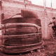 Edgar Serralde uses a ladder to climb on to his rooftop on the day a large water cistern, left, was delivered to his home in Mexico City's borough Xochimilco. With the help of Isla Urbana the 37-year-old lettuce farmer upgraded his rain harvesting system.